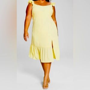 White Summer dress with split over knee.